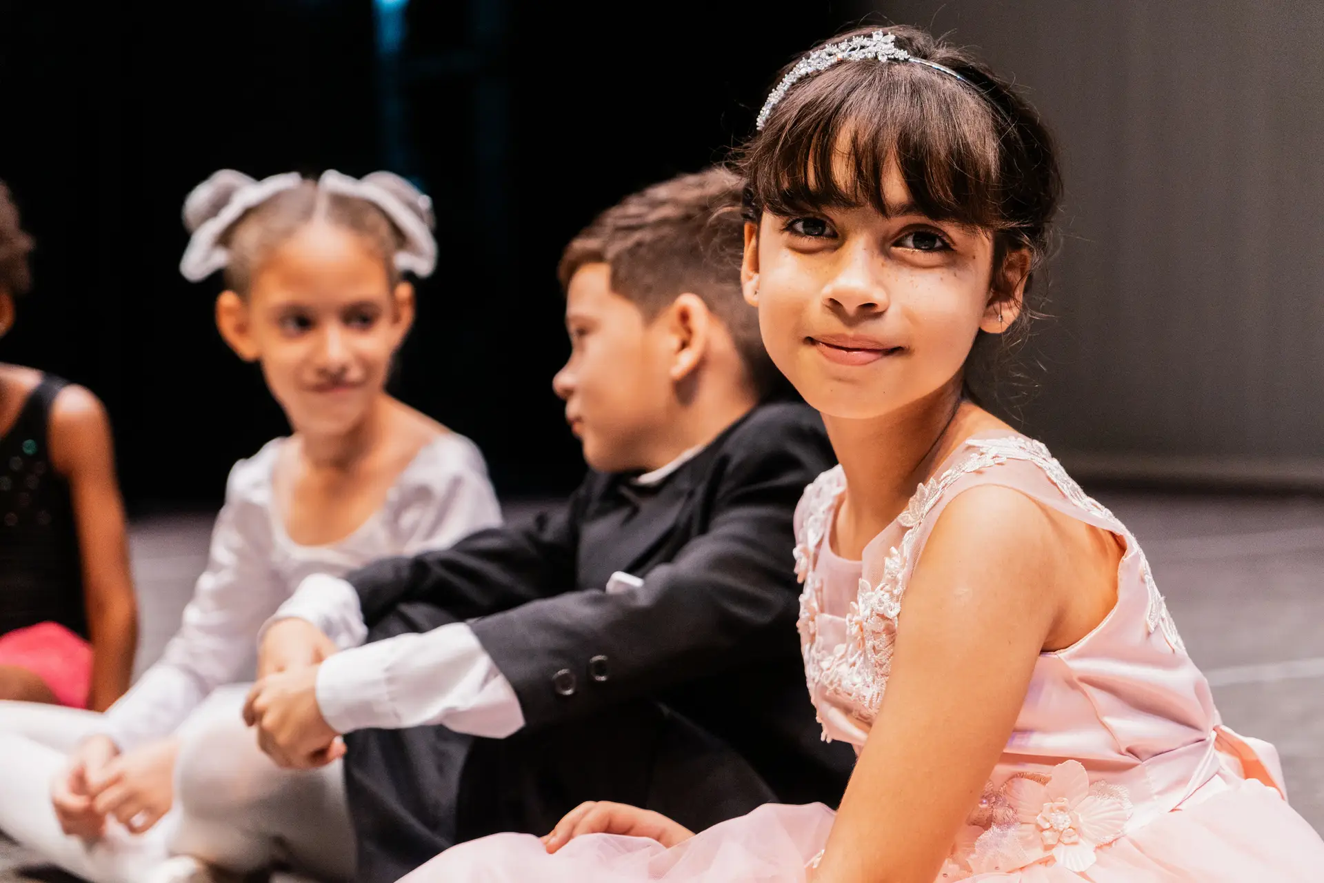 Portrait of a child performer waiting to go on stage